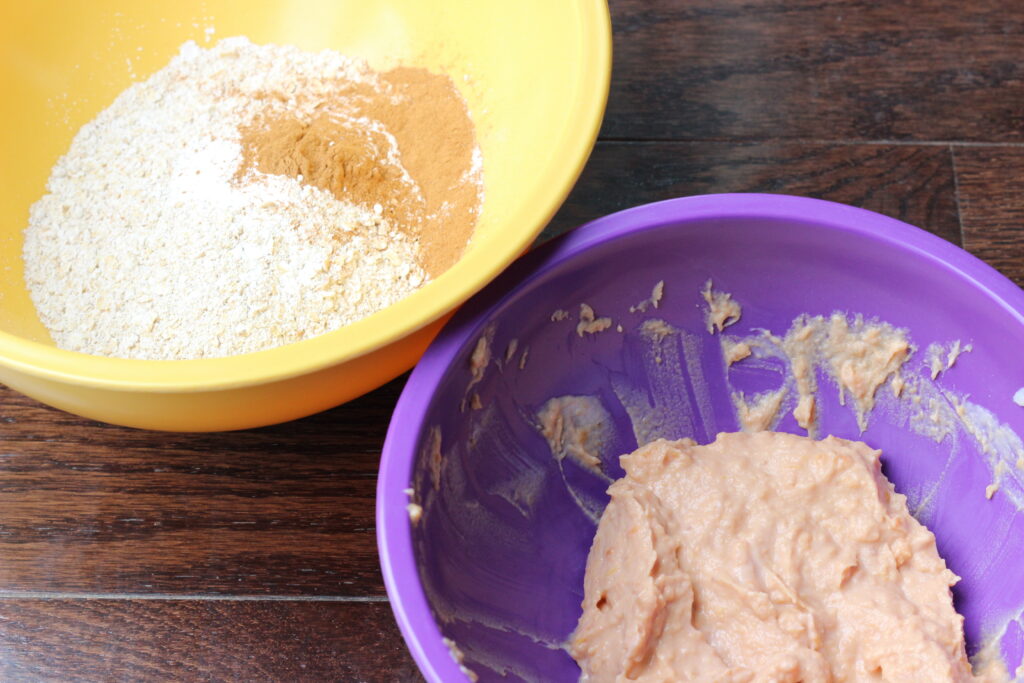 Bowls of wet and dry ingredients for butternut squash muffins recipe