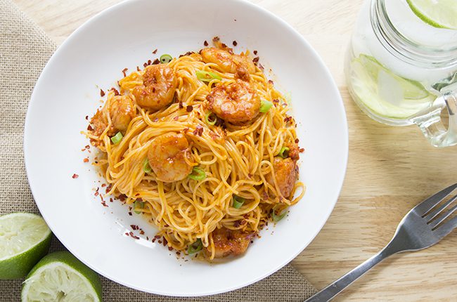 overhead shot of bang bang shrimp pasta on plate