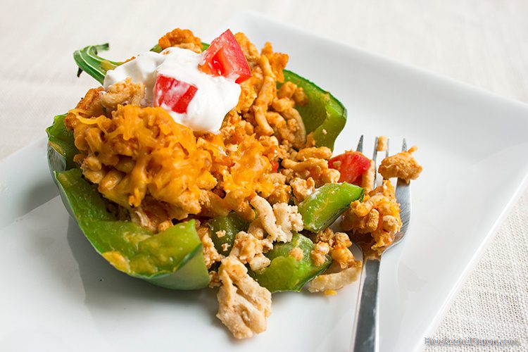 Stuffed bell pepper on white plate