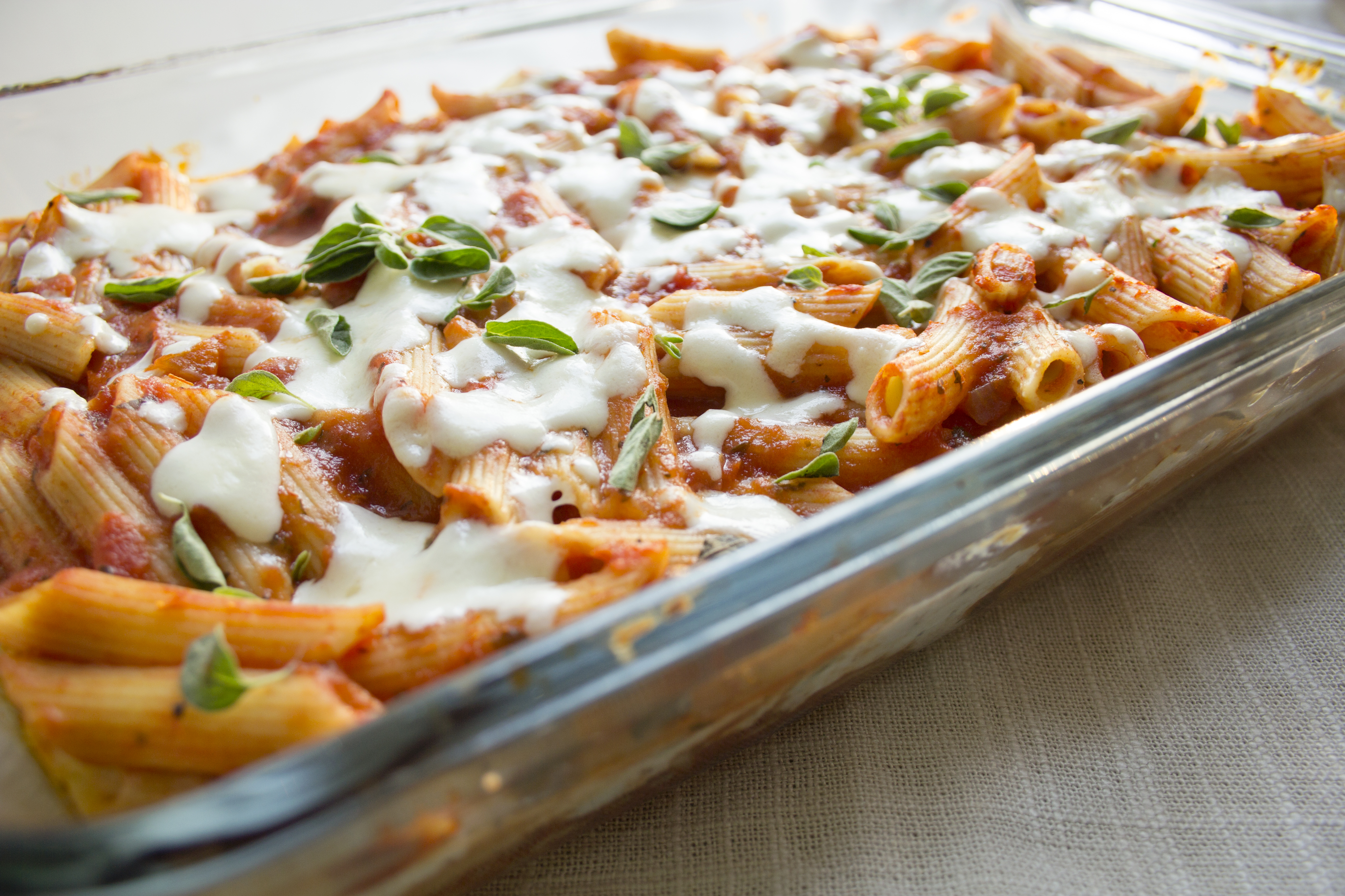 lasagna casserole baked in a casserole dish topped with cheese