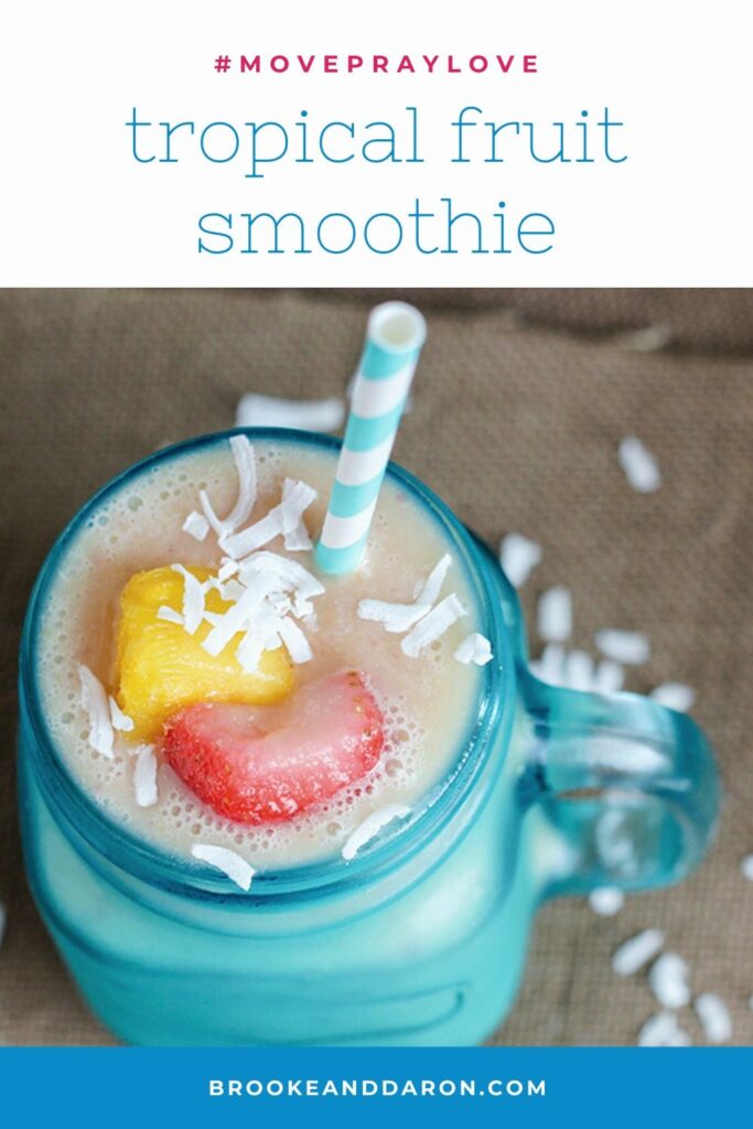Blue mason jar glass filled with smoothie