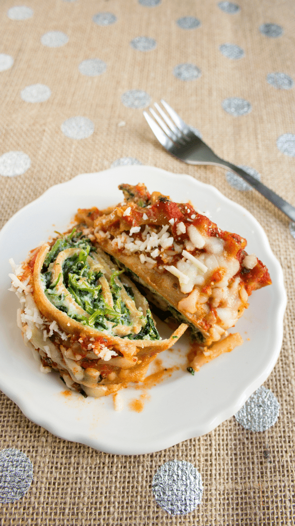 spinach lasagna roll ups on plate