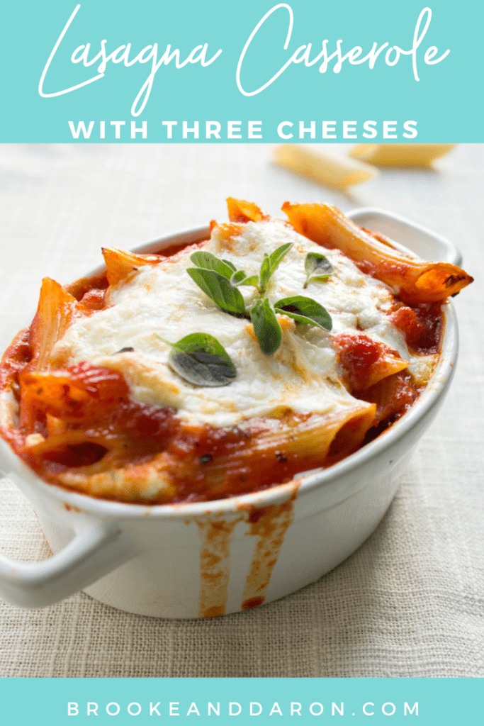 Three cheese lasagna casserole in a white crock for serving