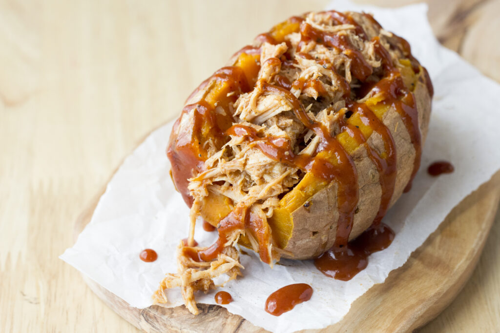 Overhead picture of stuffed sweet potato filled with bbq pulled pork