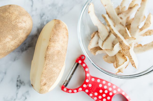 Peeling potatoes to make the best shepherds pie