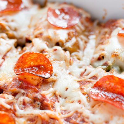 Cooked pizza lasagna roll ups