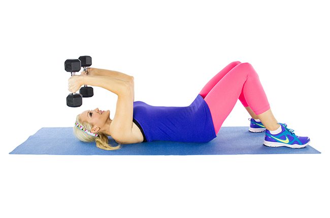 image of Brooke doing a lying skull crusher for dumbbell workout routine