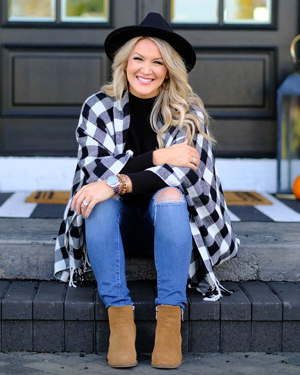 Brooke on front porch with scriptures for overcoming insecurity