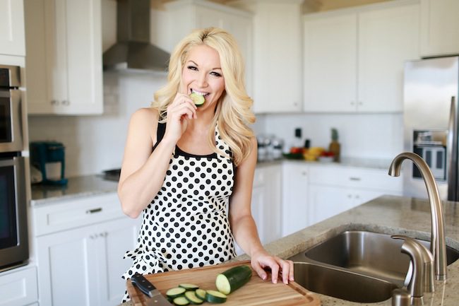 image of brooke eating cucumber to get glowing skin