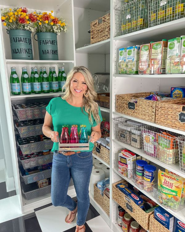 brooke in front of kitchen pantry