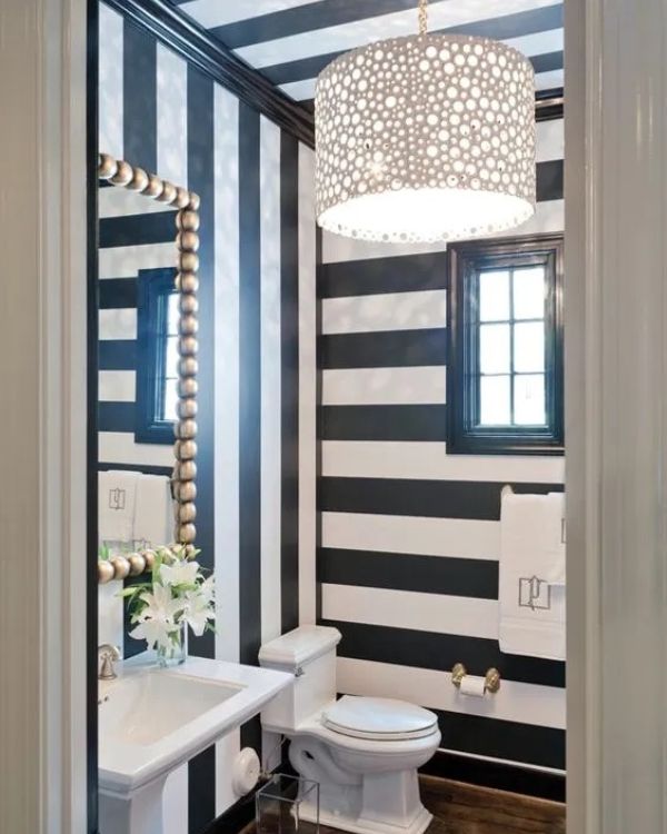 navy and white stripe powder room wallpaper