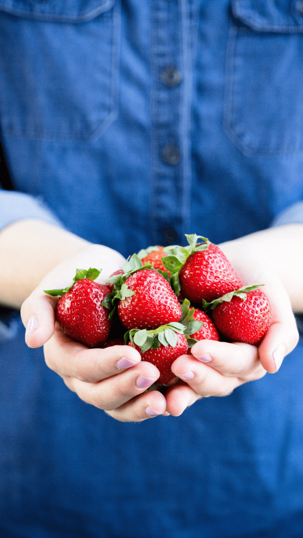 Brooke holding Strawberries