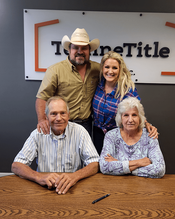 Daron, Brooke, Ed, and Donna at closing for the farm